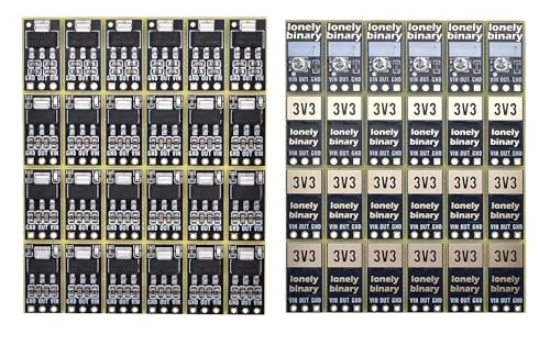 The panel of 24 regulator boards seen from both sides: on the left, four rows of six boards with the chip and capacitors facing up and GND OUT VIN printed along each; on the right, the backs, with one row of six adjustable boards showing their white trimmers and lonely binary logos, and three rows of eighteen boards printed 3V3 in a gold box.