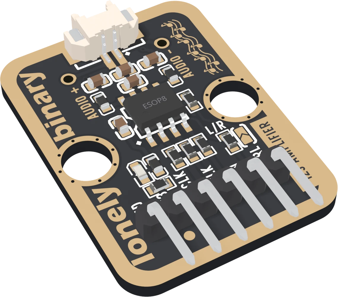 The TK100 from above at an angle: a black board with a gold border, a white two-pin speaker socket at the back between AUDIO + and AUDIO -, the eight-legged chip in the middle, a jumper marked L/R, two round LEGO holes, lonely binary up the left edge, and six right-angle pins out of the front edge.