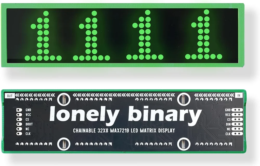 The green 32x8 matrix display seen from the front showing four digit ones in green LEDs behind a smoked cover, and from the back showing the black PCB printed lonely binary and CHAINABLE 32X8 MAX7219 LED MATRIX DISPLAY, with a six-pad header marked OUT at the left and a matching one marked IN at the right.