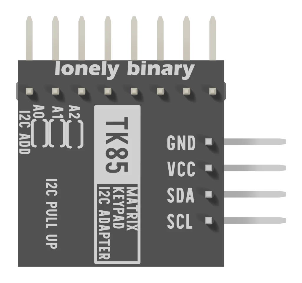 The back of the compact adapter: TK85 MATRIX KEYPAD I2C ADAPTER printed in the middle, GND, VCC, SDA and SCL beside the four pins on the right, three solder pads labelled A0, A1 and A2 with I2C ADD at the top left, and I2C PULL UP printed down the left side.