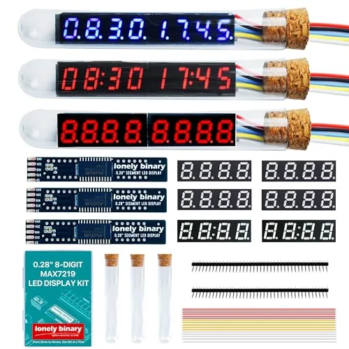 The full kit laid out on white: three finished eight-digit displays inside glass tubes with cork stoppers and five-wire ribbon cables, three bare dark driver boards printed lonely binary 0.28 inch segment LED display, six loose four-digit panels in two rows, a printed manual, three empty glass tubes with corks, two forty-pin header strips and a bundle of coloured jumper wires.