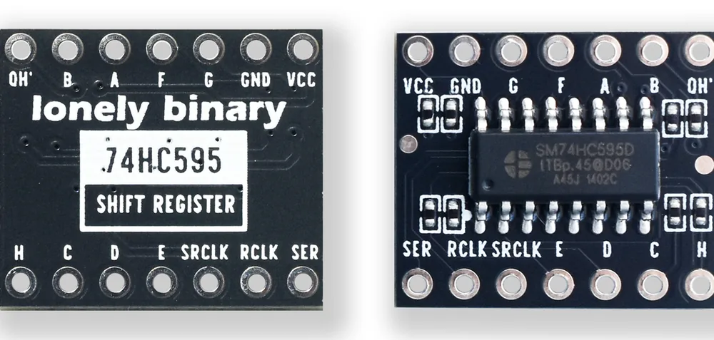 The 74HC595 driver board photographed from both sides. The label side is printed lonely binary, 74HC595, SHIFT REGISTER, with pins QH′ B A F G GND VCC along the top and H C D E SRCLK RCLK SER along the bottom. The chip side shows a 16-pin surface-mount chip marked SM74HC595D between four pairs of small black resistors, with the same pin names mirrored.