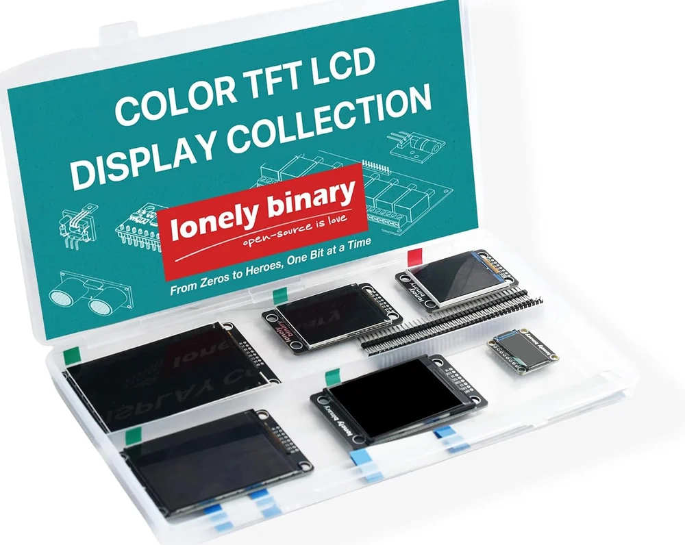 The kit's hinged clear plastic case lying open at an angle. The lid carries a teal card printed COLOR TFT LCD DISPLAY COLLECTION with the lonely binary logo, and the base holds the six dark display panels taped down with green and blue tabs, a strip of gold pin header lying between them, and the smallest panel at the right.