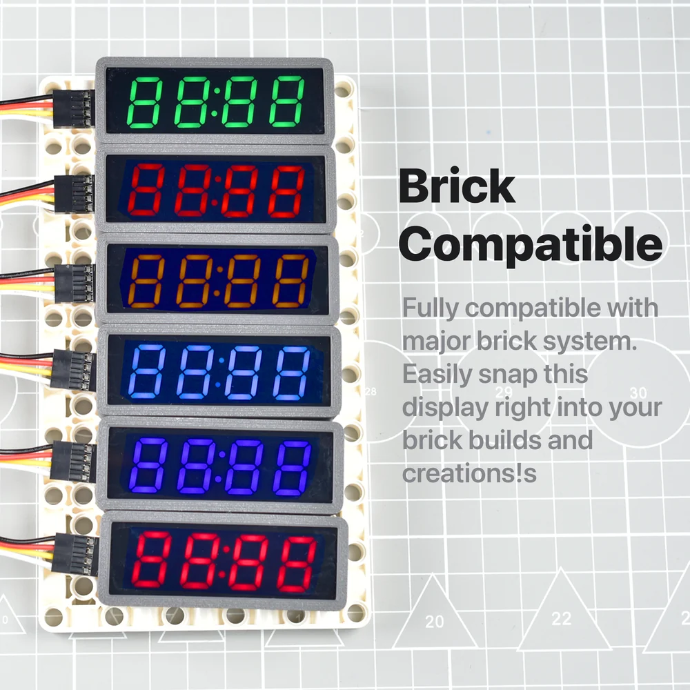 Six four-digit displays in grey enclosures mounted in a column on a white brick-compatible base plate, each with a four-wire cable plugged into the pins at its left edge, lit in green, red, orange, pale blue, blue and red.