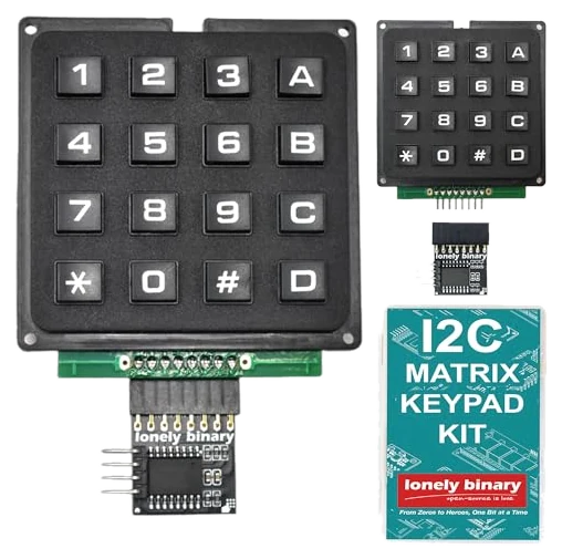 The heavy-duty 2-pack: a large keypad in a black rigid frame with raised keys, plugged into its small black adapter below, a second keypad and adapter beside it, and the teal I2C MATRIX KEYPAD KIT box.